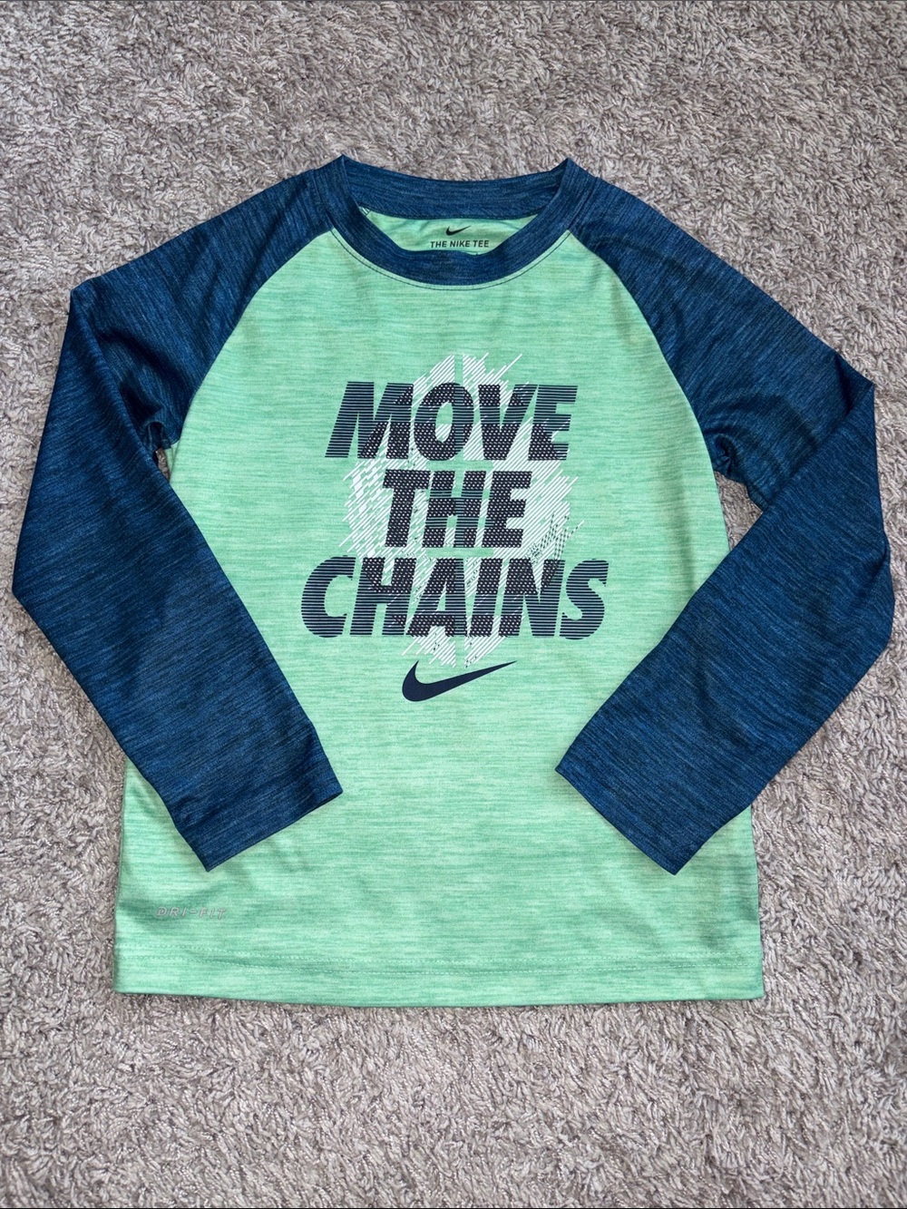 Nike Kids Long Sleeve Raglan Tee in Mint Green and Navy. Football size 6-7